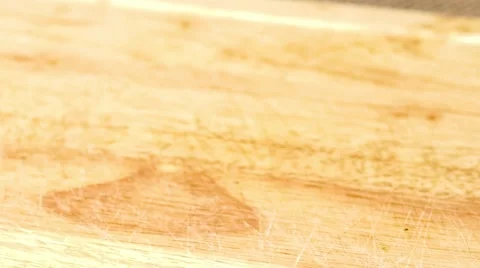 Whole broccoli bunch being separated by hand into smaller florets Stock Footage 68189532