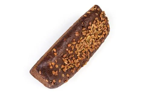 Whole brown bread triangular shape sprinkled with sunflower seeds Foto stock