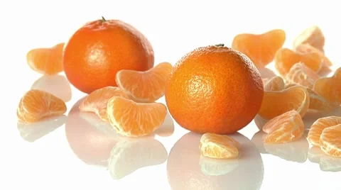 Whole clementines and segments Stock Footage 8574646