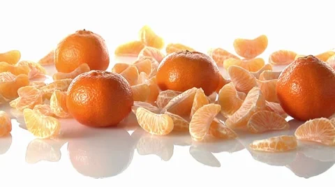 Whole clementines and segments Stock Footage 8574778