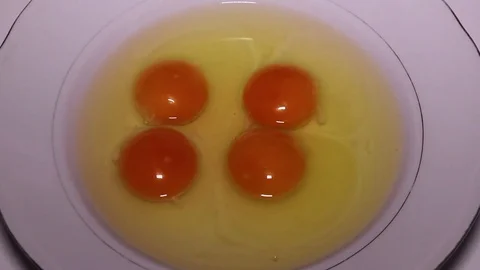 Whole Eggs, Mixing Close Up Stock Footage 75342005