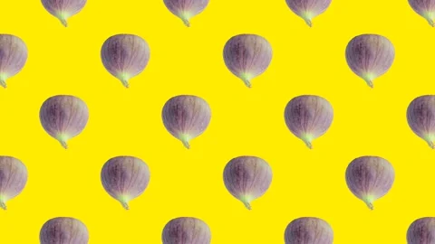 Whole fig fruit in animated grid seamless loop pattern on a yellow background Stock Footage 222319000