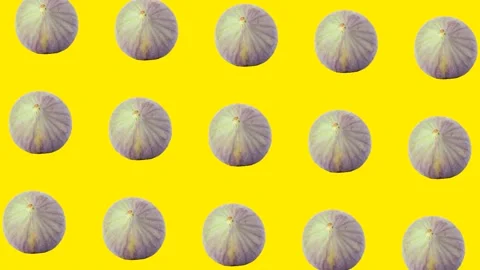 Whole fig fruit in animated grid seamless loop pattern on a yellow background Stock Footage 222326752