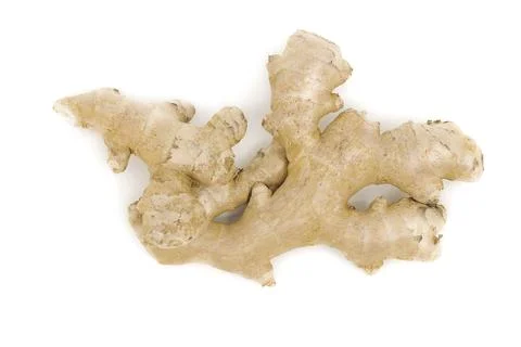 Whole ginger root captured against a white studio surface. Stock Photos