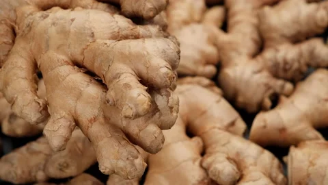Whole ginger root on close up rotating 動画素材 141356298