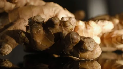 Whole ginger root on close up rotating.a composition based on ginger, fresh and Stock Footage 169778044