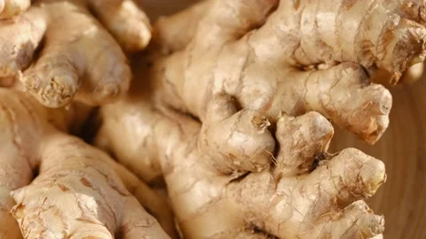 Whole ginger root on close up rotating 4K Stock Footage 231544357