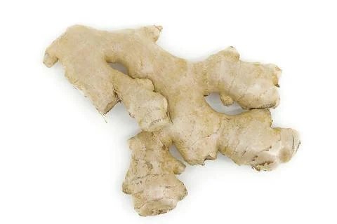 Whole ginger root displayed on plain white studio background. Stock Photos