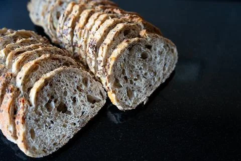 Whole Grain Bread on Black Background Stock Photos