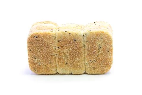 Whole grain bread bottom view with black and white sesame Stock Photos