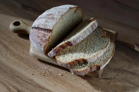 Whole grain bread into crispy slices for bruschetta. Fresh, crisp sourdough.. Stock Photos