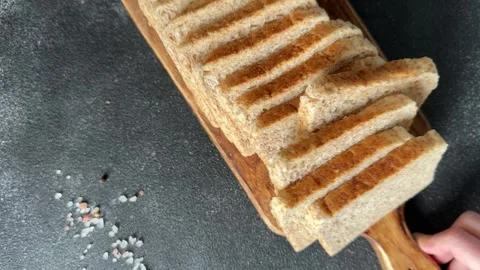 Whole-grain bread fresh baked goods, fluffy bread slices tasty snack Stock Footage 334338388
