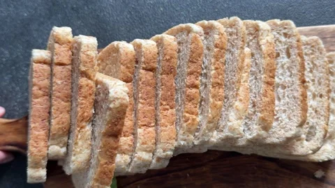 Whole-grain bread fresh baked goods, fluffy bread slices tasty snack Stock Footage 334338430