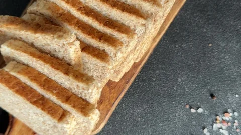 Whole-grain bread fresh baked goods fluffy bread slices tasty snack Stock Footage 335652501