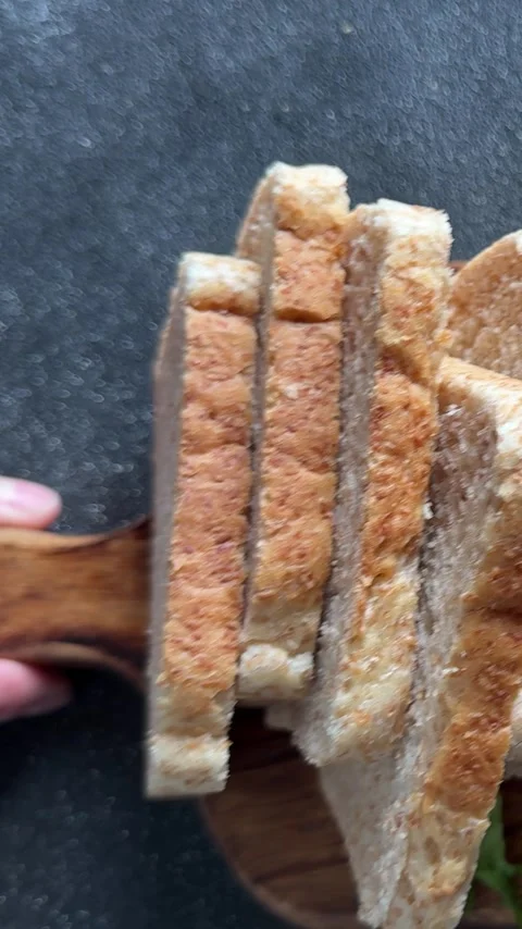Whole-grain bread fresh baked goods fluffy bread slices tasty snack Stock Footage 335652503