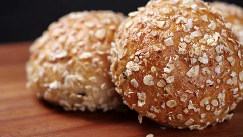 Whole grain bread rotate in dolly shot. Whole grain bread for healthy eating Stock Footage 144593825