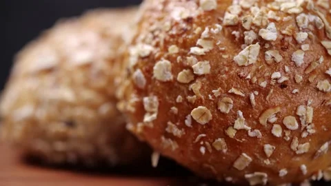 Whole grain bread rotate in slow motion. Whole grain bread for healthy eating Stock Footage 142915006