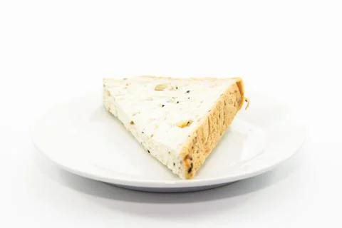 Whole grain bread section sliced on white plate Stock Photos