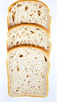 Whole grain bread with soft sliced texture isolated on white background, or.. Stock Photos