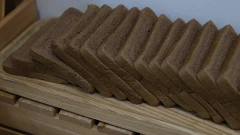 Whole grain bread for toast. Isolate on white background Stock Footage 310157983