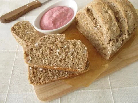 Whole grain bread with vegetable spread from beetroot and horseradish Stock Photos