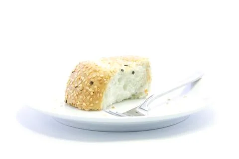 Whole grain half sliced bread breakfast on white plate Stock Photos