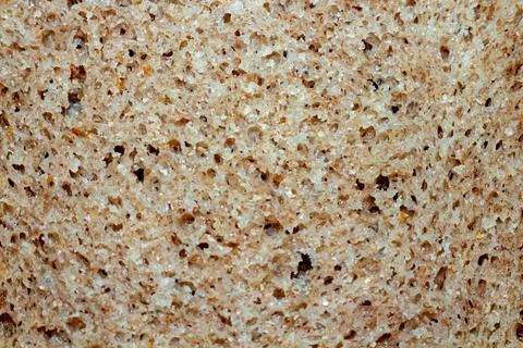 Whole grain rye bread texture background detailed slice for healthy eating Foto stock