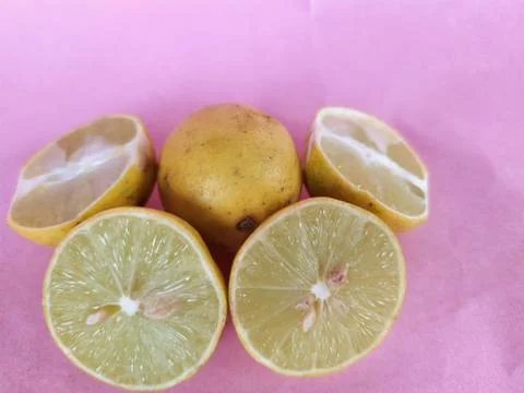 Whole lemon with half Stock Photos