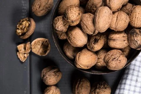 Whole nuts and nutcracker. Stock Photos
