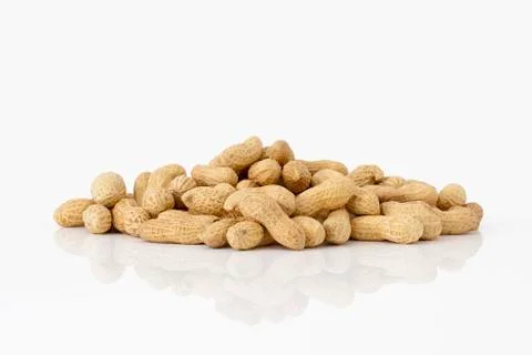 Whole peanuts on white background Stock Photos
