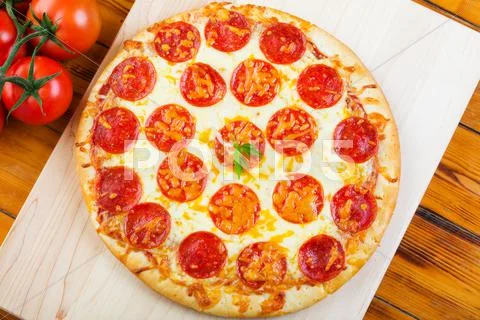 Whole pepperoni pizza Stock Photos