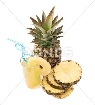 Whole pineapple with glass of its juice isolated over white background Stock Photos