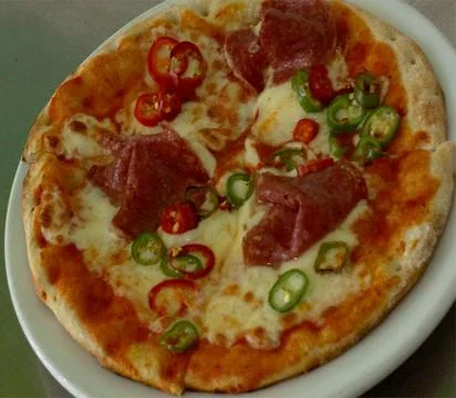 Whole pizza Stock Photos