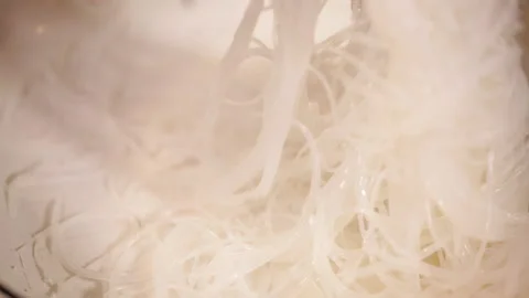 The whole process of soaking bubbles in boiling water to make fans (5) Stock Footage 202259024