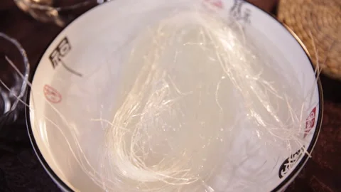 The whole process of soaking bubbles in boiling water to make fans (2) Stock Footage 202259030