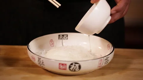 The whole process of soaking bubbles in boiling water to make fans (4) Stock Footage 202259031