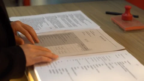 The whole process of sorting out official documents, signing and sealing Stock Footage 125350349
