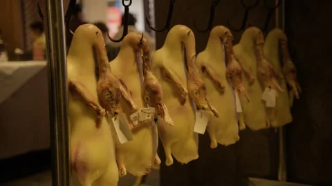 Whole Raw Ducks Hanging in Restaurant Kitchen for Preparation, Beijing, China Stock Footage 345788417