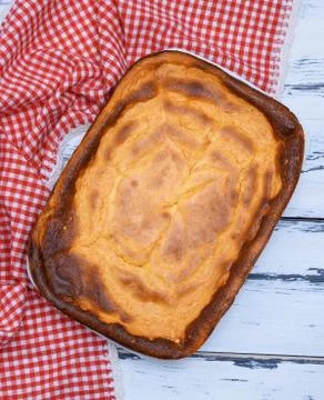 Whole rectangular pie of cottage cheese and pumpkin Stock Photos
