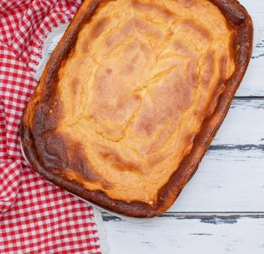 Whole rectangular pie of cottage cheese and pumpkin Stock Photos