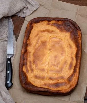 Whole rectangular pie of cottage cheese and pumpkin Stock Photos