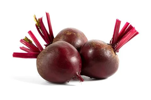Whole red beetroot on white background. Stock Photos