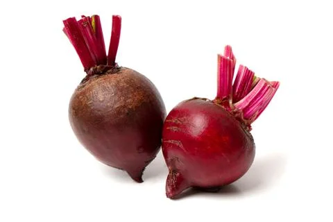 Whole red beetroot on white background. Stock Photos