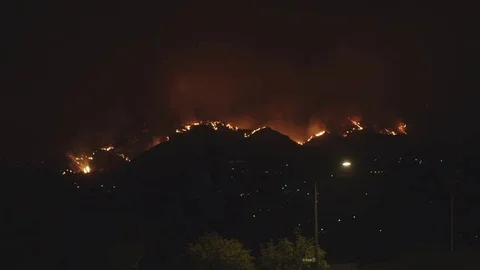 Whole ridge in flames Stock Footage 79637546