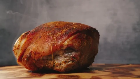 Whole Roasted Pork with Rub on Board Smoking Stock Footage 326694580