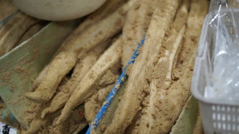 Whole vegetable daikon radish pickled with miso misozeke Japanese food sale i Stock Footage 201404837