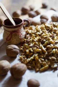 Whole walnuts and walnut kernels Stock Photos