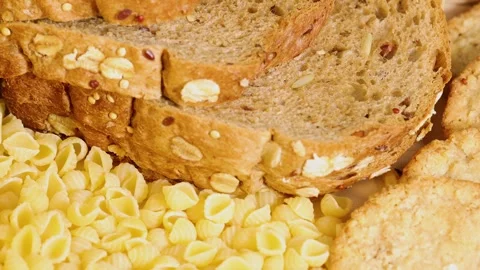 Whole Wheat Bread and Pasta with Corn Kernels Video stock 307913082