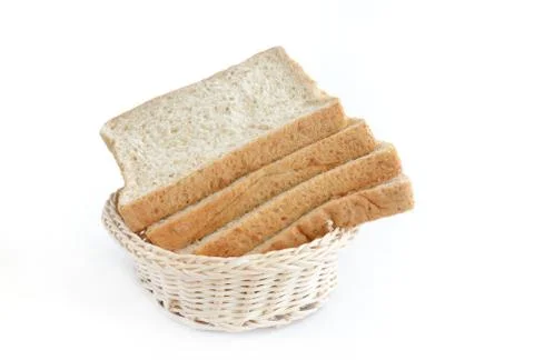 Whole wheat bread in basket Stock Photos