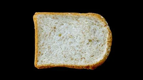 Whole wheat bread on black background. Foto stock